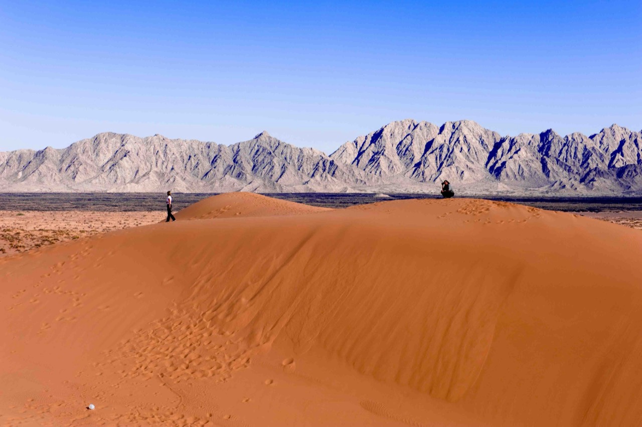 Red sand dunes and desert ranges in El Pinacate y Gran Desierto de Altar Biosphere Reserve