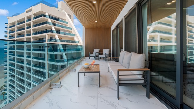 Balcony of Casa Pelícano over the sea
